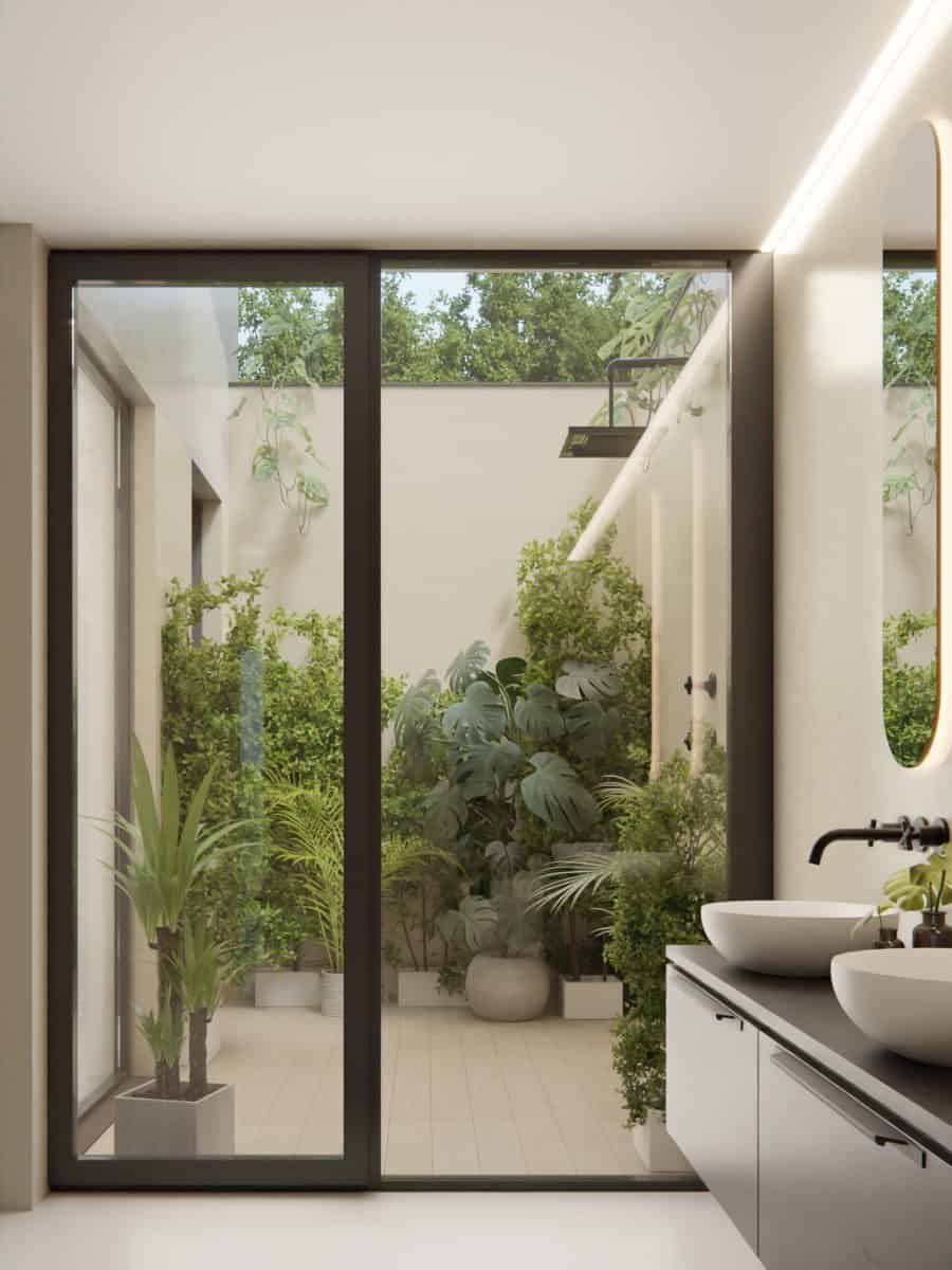 moderne nieuwbouw Lennik badkamer met mortex en patio met buitendouche